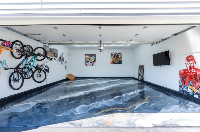 37 William St, Bohemia, NY 11716 - garage featuring baseboards