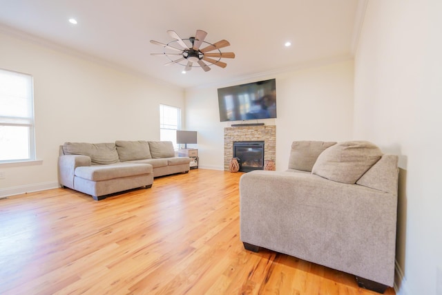37 William St, Bohemia, NY 11716 - living area featuring ornamental molding, a ceiling fan, light wood finished floors, a fireplace, and recessed lighting