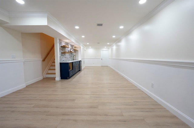 37 William St, Bohemia, NY 11716 - unfurnished living room featuring a fireplace, ornamental molding, recessed lighting, light wood-style floors, and stairs