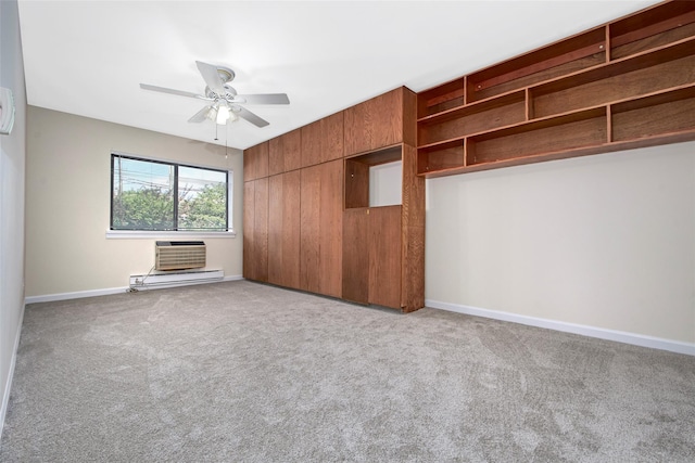 115 Dehaven Dr Unit 214, Yonkers, NY 10703 - unfurnished bedroom with carpet floors, a baseboard radiator, a wall mounted air conditioner, and ceiling fan
