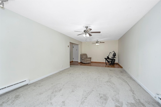 115 Dehaven Dr Unit 214, Yonkers, NY 10703 - spare room featuring carpet flooring, a baseboard heating unit, and ceiling fan