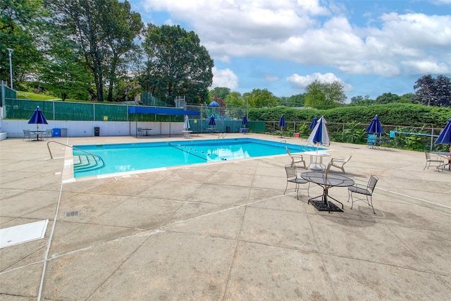 115 Dehaven Dr Unit 214, Yonkers, NY 10703 - community pool featuring a patio area