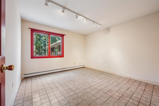 27 Jagger Ln, Westhampton, NY 11977 - empty room with baseboard heating and rail lighting