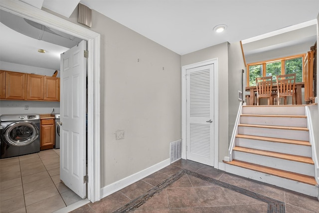 3324 Sycamore Ln, Yorktown Heights, NY 10598 - staircase featuring washer / dryer, inlaid floor details, and tile patterned flooring