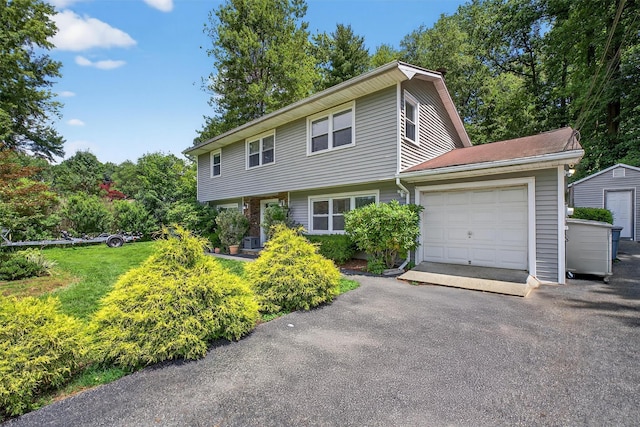 3324 Sycamore Ln, Yorktown Heights, NY 10598 - colonial home with an attached garage, a storage shed, and driveway