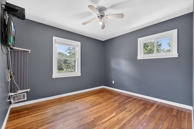 3324 Sycamore Ln, Yorktown Heights, NY 10598 - unfurnished room with plenty of natural light, hardwood / wood-style floors, and a ceiling fan