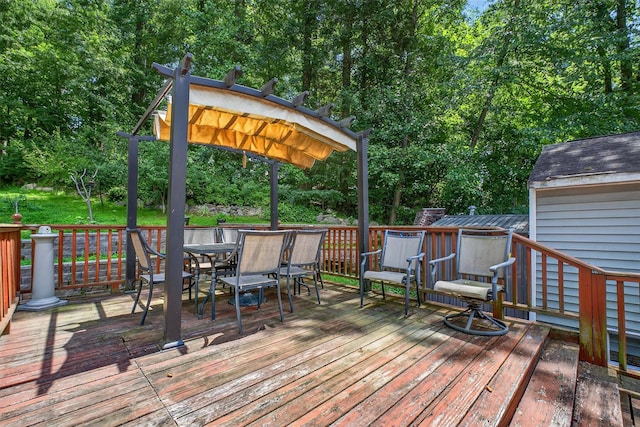 3324 Sycamore Ln, Yorktown Heights, NY 10598 - wooden terrace featuring outdoor dining area and view of wooded area