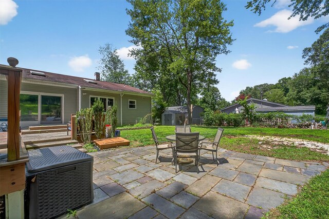 3324 Sycamore Ln, Yorktown Heights, NY 10598 - view of patio / terrace with outdoor dining space and a storage unit