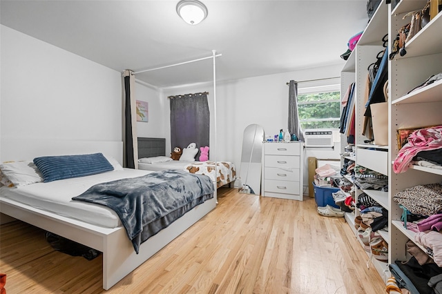 74-25 93rd Ave, Woodhaven, NY 11421 - bedroom featuring wood finished floors and cooling unit