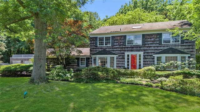 26 Rolling Dr, Brookville, NY 11545 - colonial inspired home with a front lawn