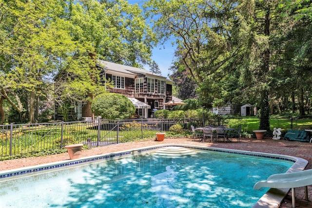 26 Rolling Dr, Brookville, NY 11545 - view of pool with a water slide