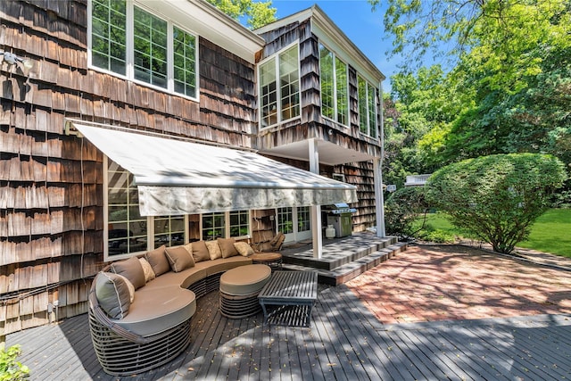 26 Rolling Dr, Brookville, NY 11545 - wooden terrace with outdoor lounge area