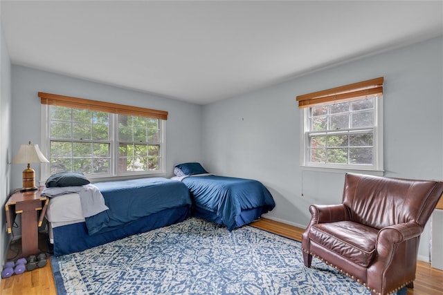 26 Rolling Dr, Brookville, NY 11545 - bedroom featuring wood finished floors