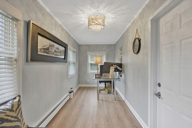 3309 Balsam St, Oceanside, NY 11572 - entryway featuring baseboard heating, light wood finished floors, crown molding, and a chandelier