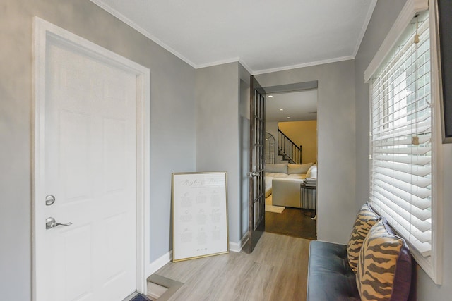 3309 Balsam St, Oceanside, NY 11572 - corridor with light wood-style flooring, crown molding, and stairway