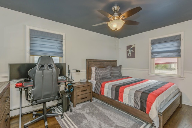 3309 Balsam St, Oceanside, NY 11572 - bedroom featuring wood finished floors, a desk, and a ceiling fan