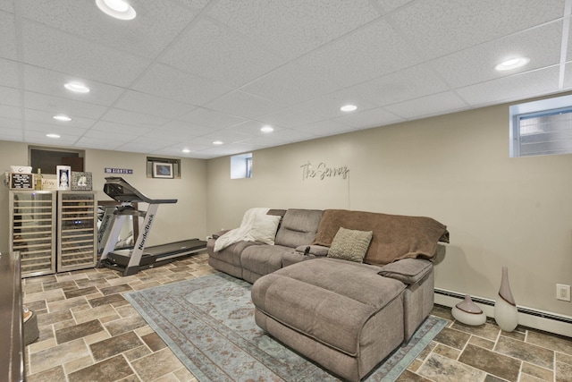 3309 Balsam St, Oceanside, NY 11572 - living area with recessed lighting, a drop ceiling, and stone finish floors