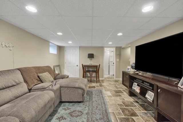 3309 Balsam St, Oceanside, NY 11572 - living area with stone finish floors, recessed lighting, and a paneled ceiling