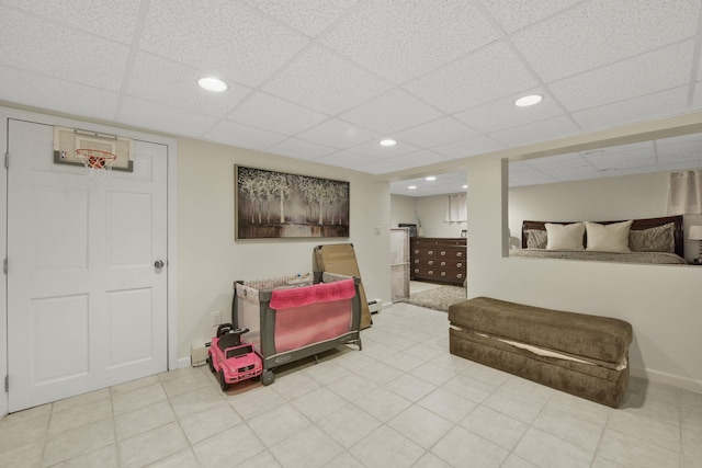 3309 Balsam St, Oceanside, NY 11572 - interior space featuring recessed lighting, a drop ceiling, and a baseboard heating unit
