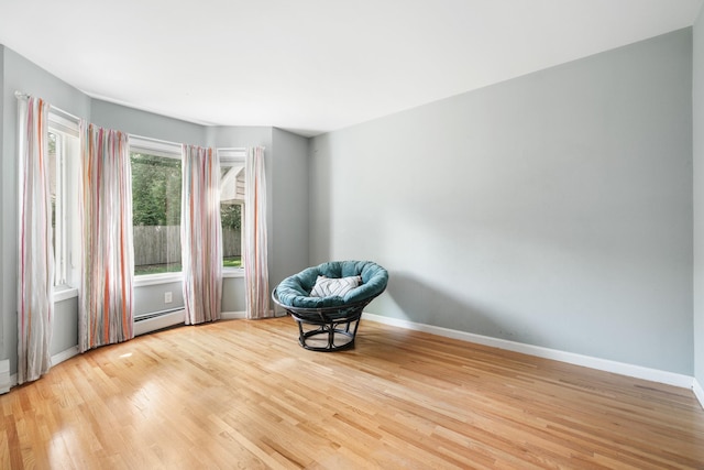 70 Hickory St, Blauvelt, NY 10913 - unfurnished room featuring baseboard heating and wood finished floors