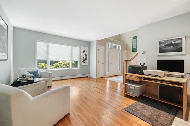 70 Hickory St, Blauvelt, NY 10913 - living room with a baseboard radiator, wood finished floors, and a desk