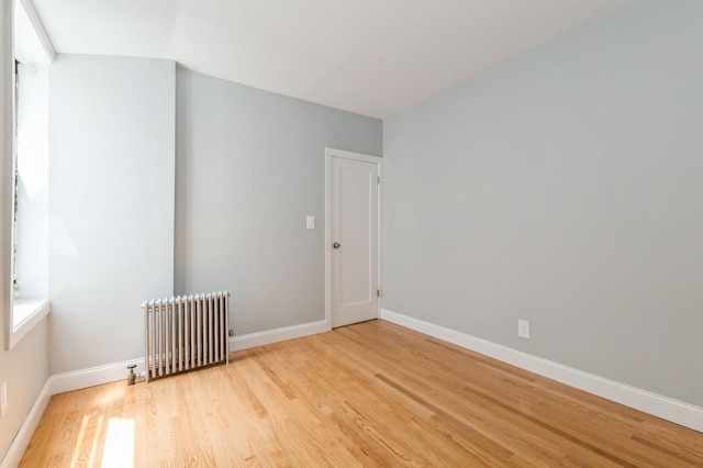 1110 Caton Ave Unit 5C, Brooklyn, NY 11218 - spare room with radiator heating unit and light wood-type flooring