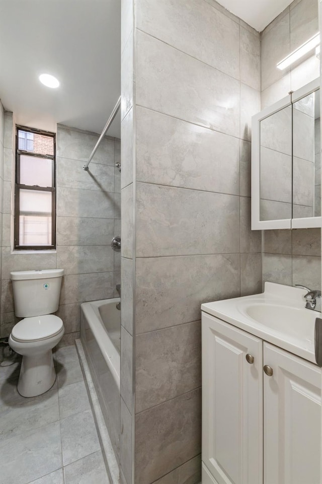 1110 Caton Ave Unit 5C, Brooklyn, NY 11218 - full bath featuring tile walls, vanity, and shower / washtub combination