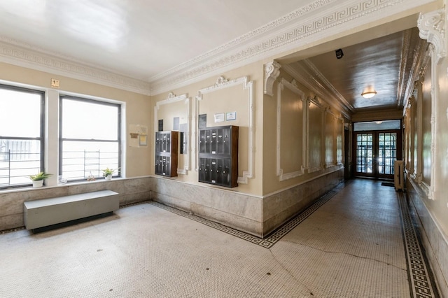 1110 Caton Ave Unit 5C, Brooklyn, NY 11218 - building lobby featuring ornamental molding and a wainscoted wall