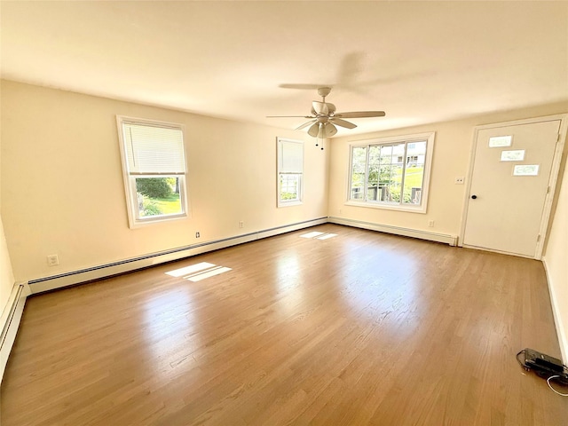 55 Red Mill Rd, Cortlandt Manor, NY 10567 - empty room featuring wood finished floors, a ceiling fan, and a baseboard radiator