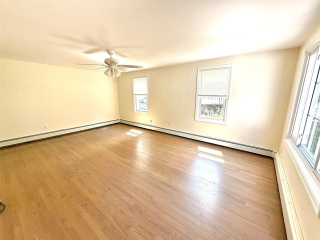 55 Red Mill Rd, Cortlandt Manor, NY 10567 - empty room with healthy amount of natural light, wood finished floors, a ceiling fan, and baseboard heating