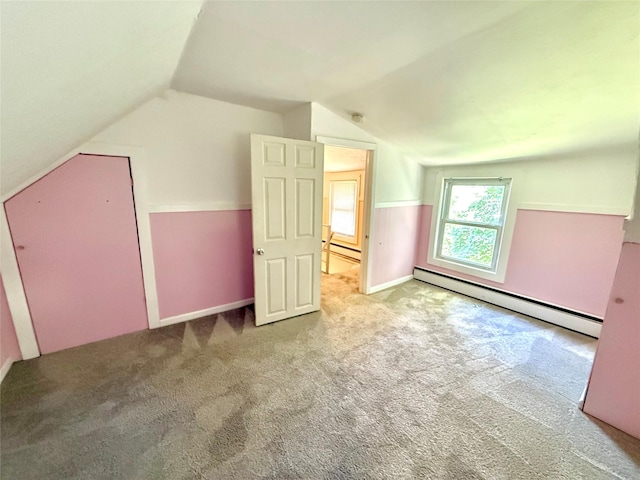 55 Red Mill Rd, Cortlandt Manor, NY 10567 - bonus room with a baseboard radiator, vaulted ceiling, and carpet