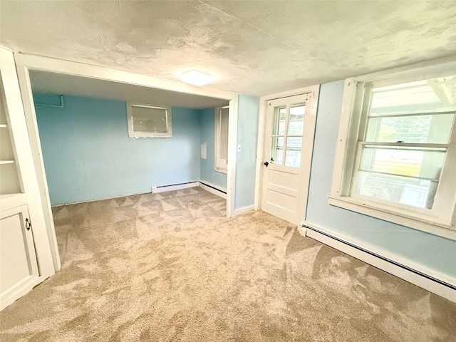 55 Red Mill Rd, Cortlandt Manor, NY 10567 - unfurnished room with baseboard heating and light carpet