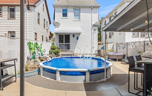 96-36 149th Ave, Ozone Park, NY 11417 - view of swimming pool with a fenced backyard and outdoor lounge area