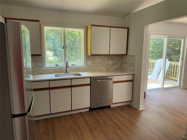 5760 Rte 82, Clinton Corners, NY 12514 - kitchen with dishwasher, freestanding refrigerator, light countertops, wood finished floors, and vaulted ceiling