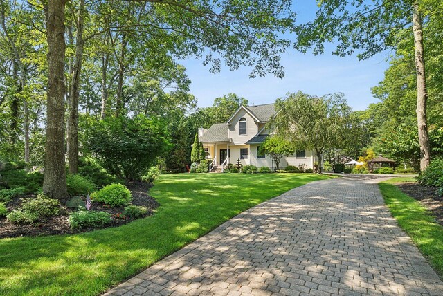 1 Alexis, Speonk, NY 11972 - view of front facade featuring a front yard and roof with shingles