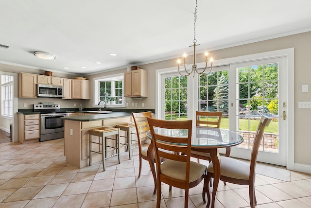 1 Alexis, Speonk, NY 11972 - dining room featuring crown molding, plenty of natural light, a chandelier, light tile patterned floors, and recessed lighting