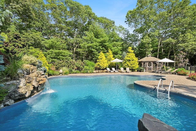 1 Alexis, Speonk, NY 11972 - outdoor pool with a patio and an outbuilding