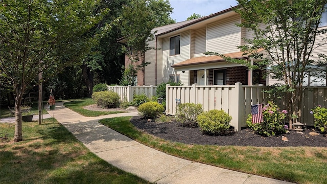 972 Skyline Dr Unit 972, Coram, NY 11727 - view of property exterior with covered porch and brick siding