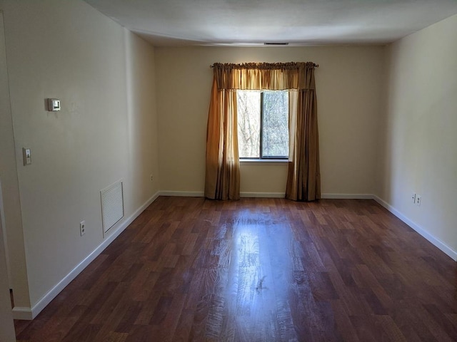 972 Skyline Dr Unit 972, Coram, NY 11727 - unfurnished room with wood finished floors and baseboards