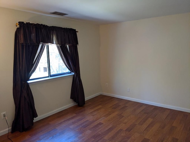 972 Skyline Dr Unit 972, Coram, NY 11727 - spare room featuring wood finished floors