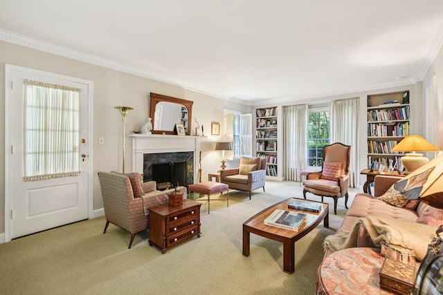 21 Orchard Dr, East Williston, NY 11596 - carpeted living area featuring ornamental molding, a premium fireplace, and built in features