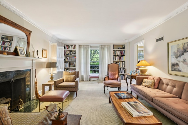 21 Orchard Dr, East Williston, NY 11596 - carpeted living area featuring built in shelves, ornamental molding, and a fireplace