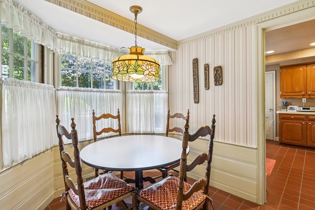 21 Orchard Dr, East Williston, NY 11596 - dining area featuring wallpapered walls and dark tile patterned floors