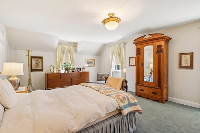 21 Orchard Dr, East Williston, NY 11596 - carpeted bedroom featuring baseboards and vaulted ceiling