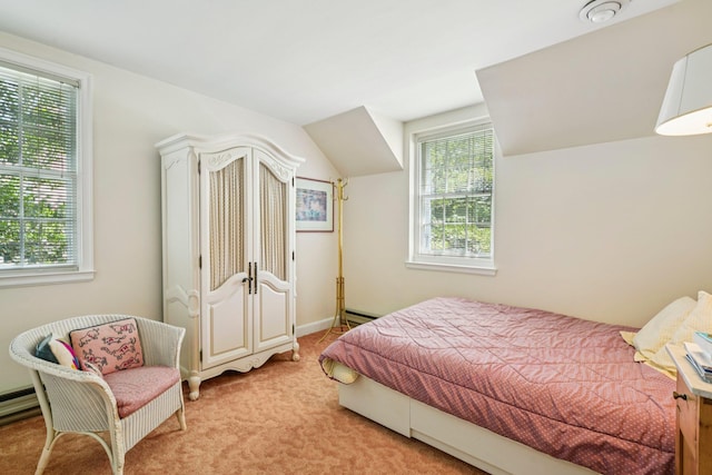 21 Orchard Dr, East Williston, NY 11596 - bedroom with light carpet and a baseboard radiator