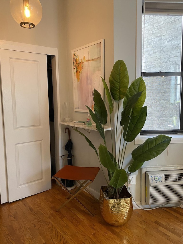 344 E 87th St Unit 3C, New York Manhattan, NY 10128 - entrance foyer with wood finished floors and a wall unit AC