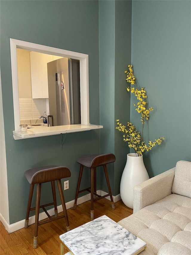344 E 87th St Unit 3C, New York Manhattan, NY 10128 - sitting room featuring wood finished floors