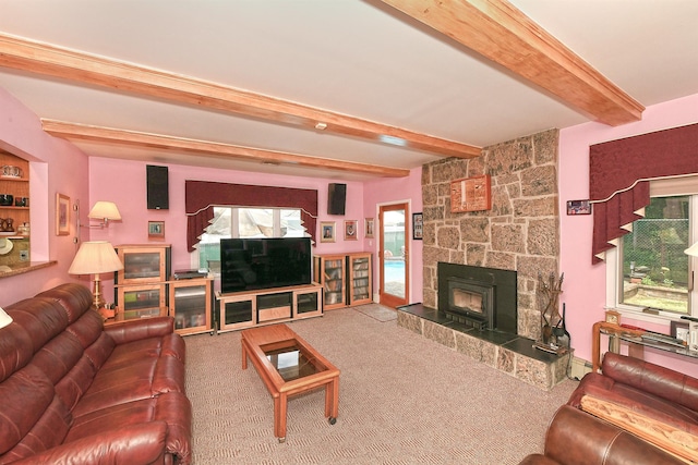 3665 Centerview Ave, Wantagh, NY 11793 - carpeted living room featuring beam ceiling and a fireplace