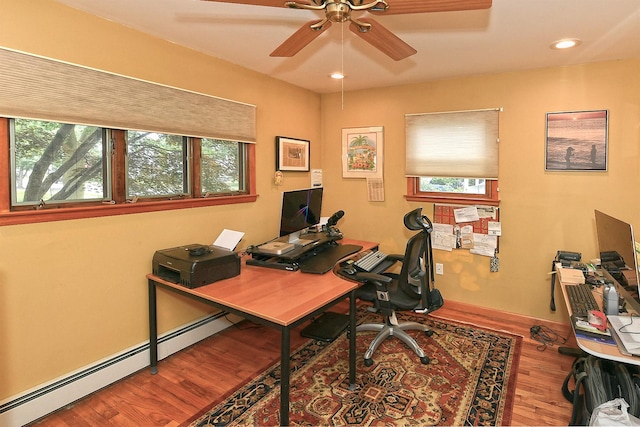 3665 Centerview Ave, Wantagh, NY 11793 - office featuring a baseboard heating unit, healthy amount of natural light, wood finished floors, and recessed lighting