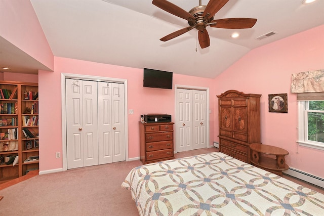 3665 Centerview Ave, Wantagh, NY 11793 - carpeted bedroom featuring two closets, vaulted ceiling, baseboard heating, recessed lighting, and a baseboard heating unit